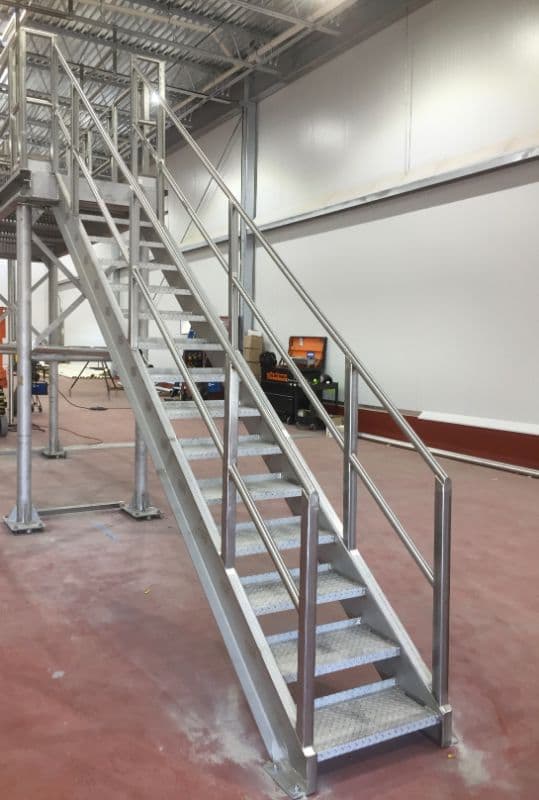 Fabricated stainless access stairs in an industrial facility